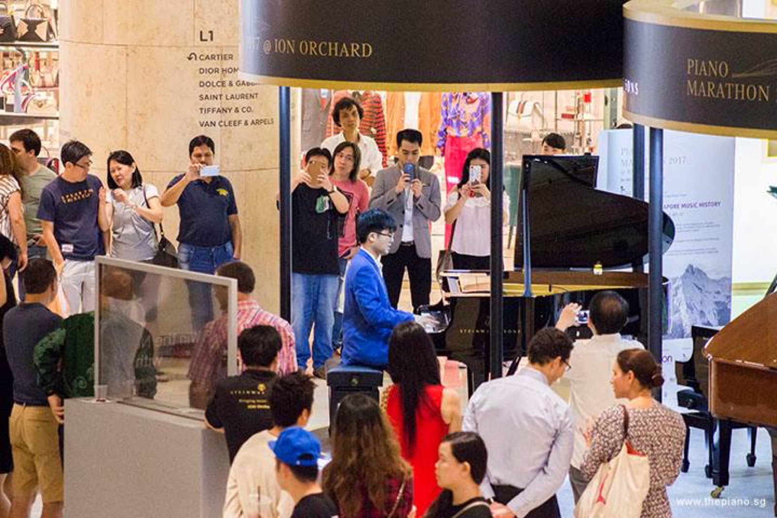 Jaeyong Kang performing at the Piano Marathon at ION Orchard, Singapore