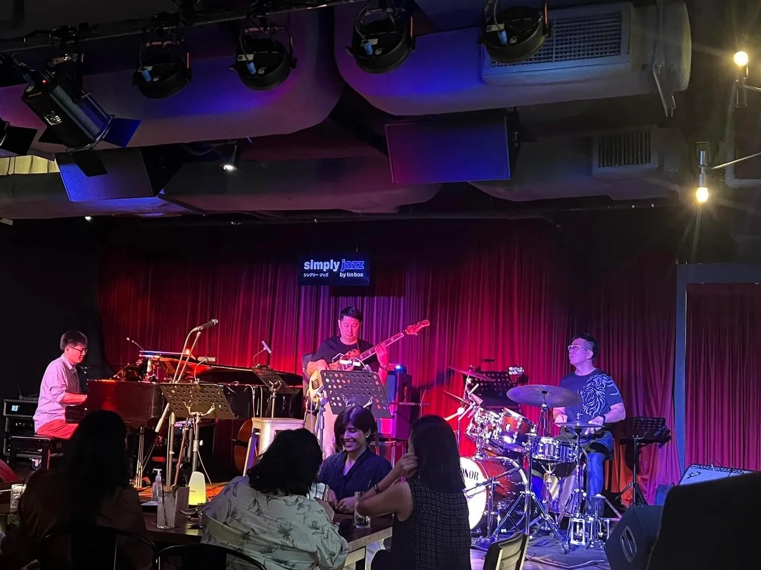 Jaeyong Kang performing piano with a live band